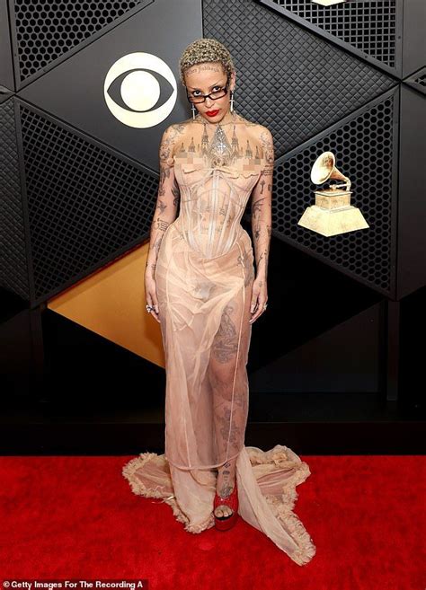 doja cat nipple|Doja Cat suffers a nip slip at Grammys 2024